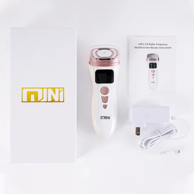 RF radio frequency multifunction beauty instrument with packaging on a white background