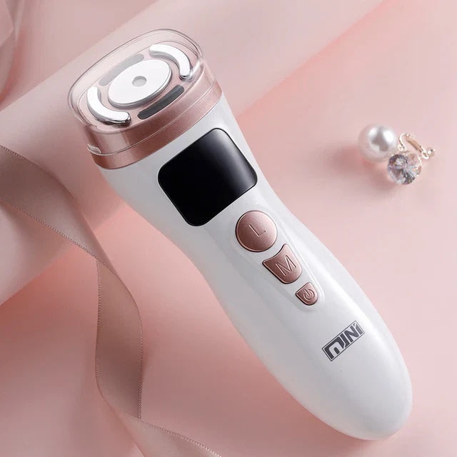 Face lifting Beauty device on a soft pink background